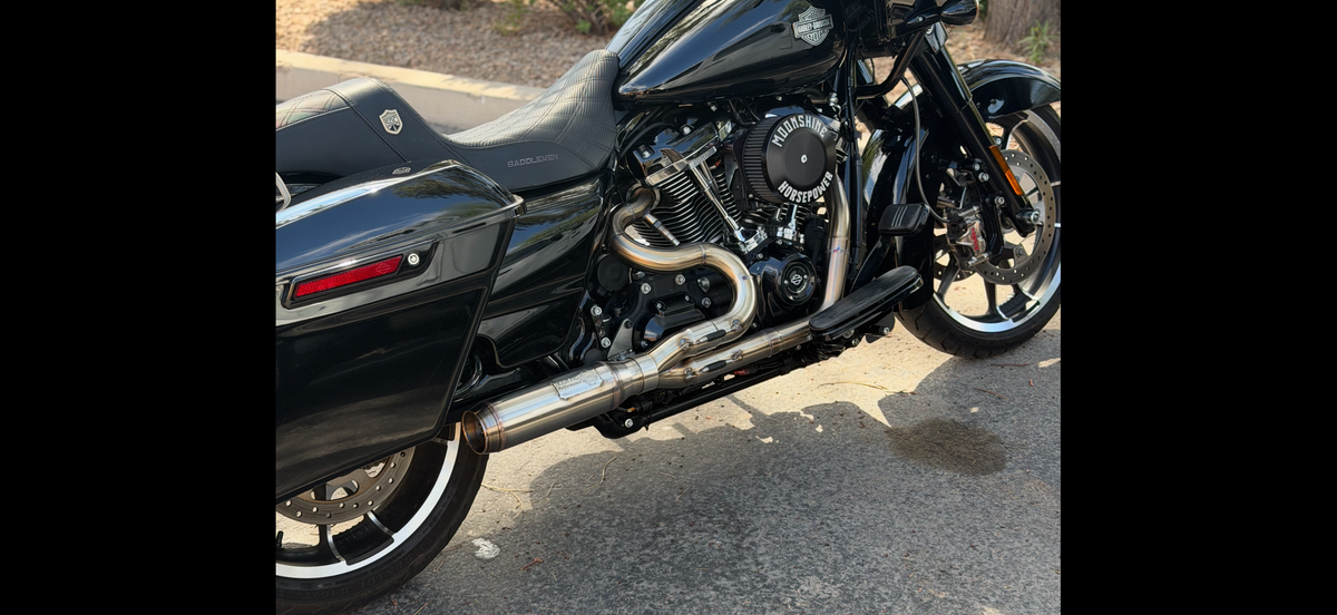 Harley-Davidson Road Glide with Irish Pig Performance 2-Into-1 mid-length exhaust, full right-side view