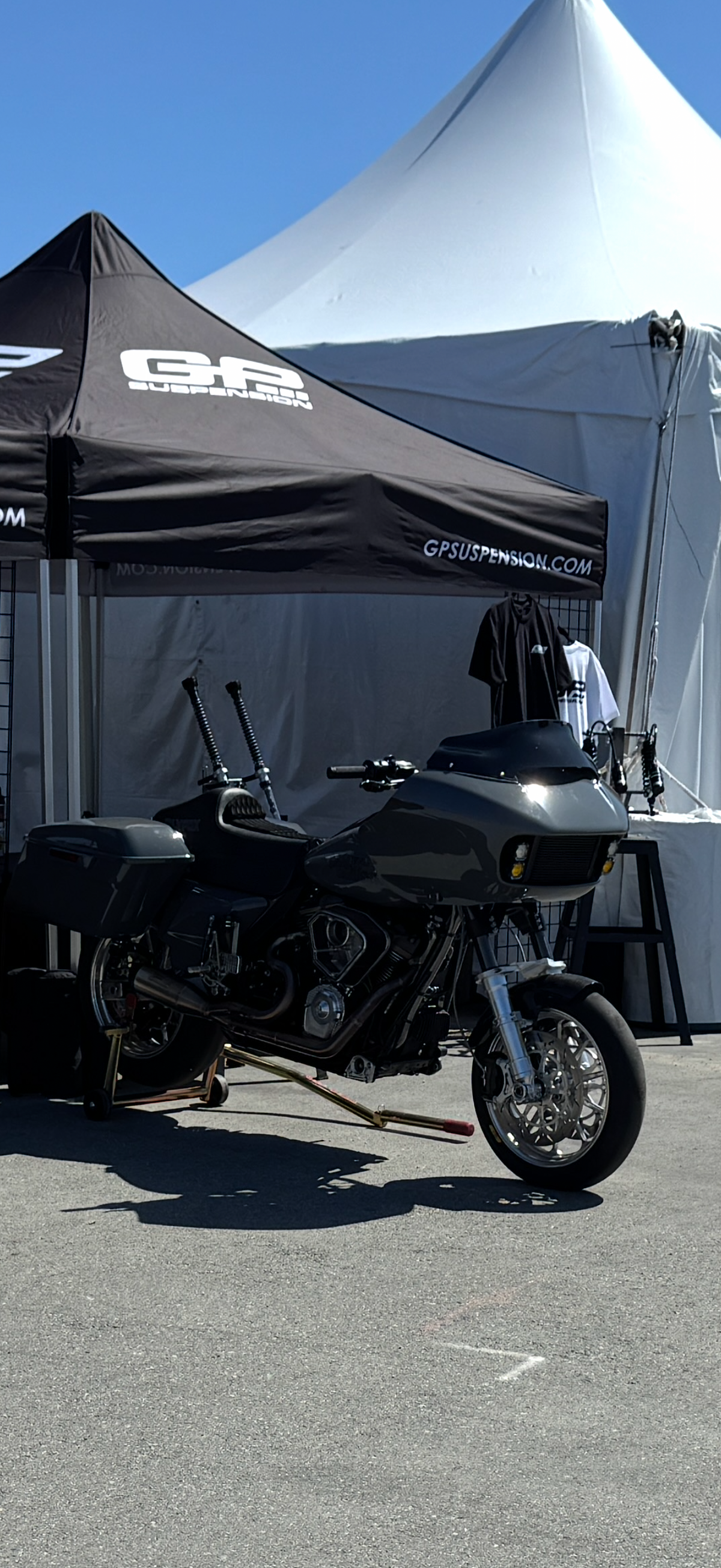 Jon Thorntons Harley-Davidson Road Glide on display at the GP Suspensions booth at Laguna Seca 2026