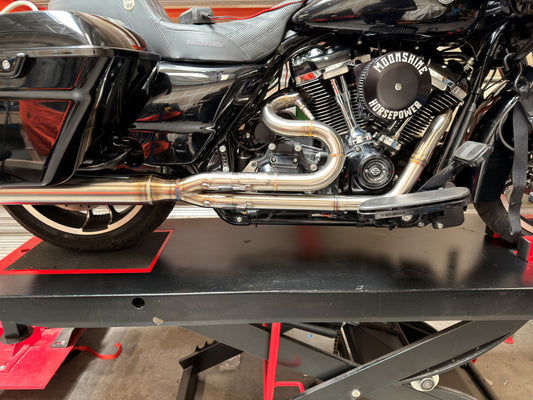 Irish Pig Performance Harley-Davidson Road Glide full-length 2-Into-1 exhaust installed on Milwaukee-Eight motorcycle