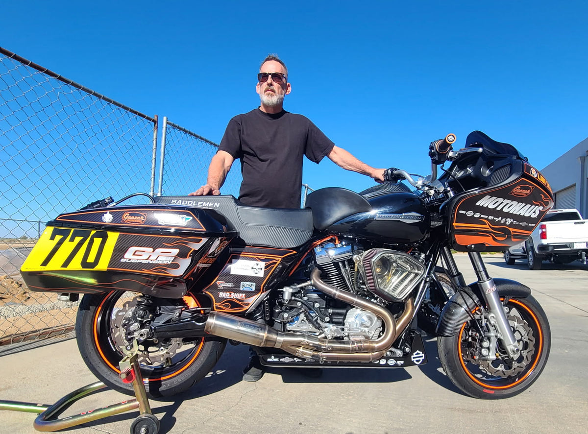 Mike Strozzi (@MotoHausCycles) with his No.770 Harley-Davidson race bike fraturing a handcrafted Irish Pig Performance exhaust.